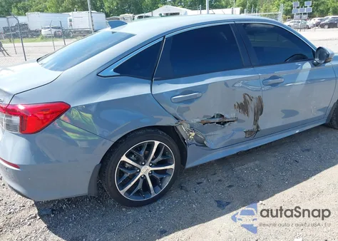 2024 Honda Civic Touring z USA, uszkodzony, nr VIN 2HGFE1F90RH323188